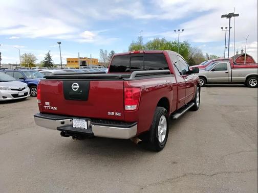 Red 2004 Nissan Titan SE King Cab