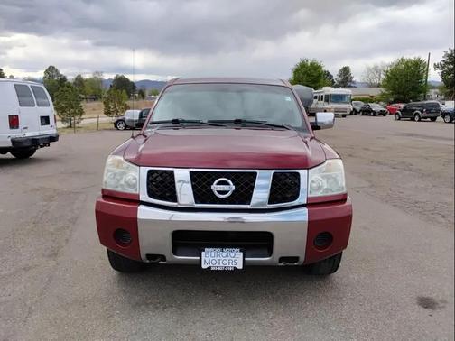 Red 2004 Nissan Titan SE King Cab