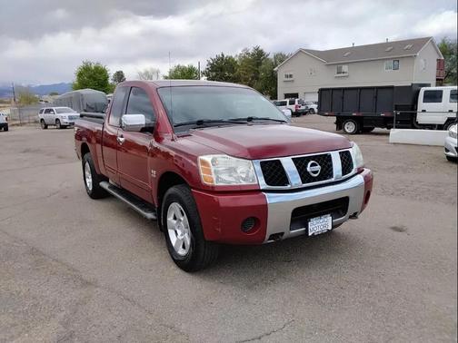 Red 2004 Nissan Titan SE King Cab