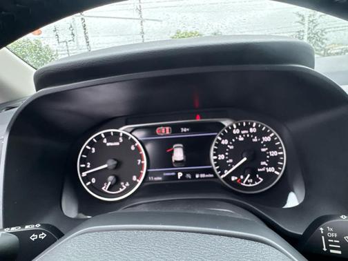 Scarlet Ember 2026 Nissan Rogue SV