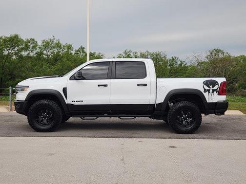 Bright White Clearcoat 2025 RAM 1500 RHO Crew Cab 4x4 5'7' Box