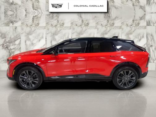 Orange 2025 Cadillac OPTIQ Sport