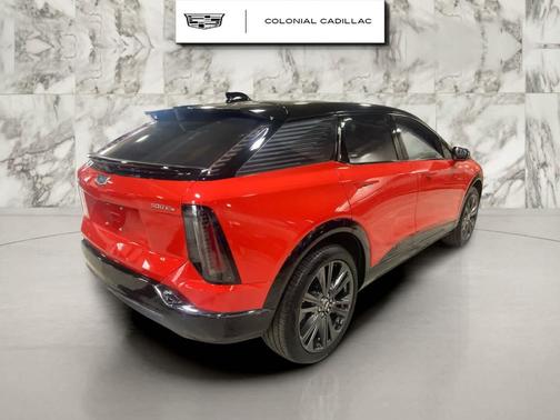 Orange 2025 Cadillac OPTIQ Sport