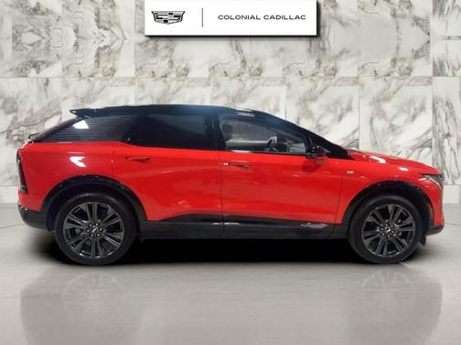 Orange 2025 Cadillac OPTIQ Sport