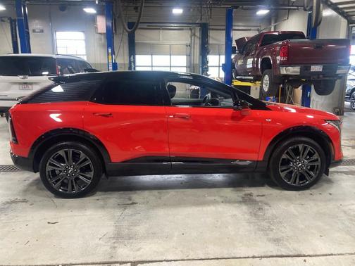 Orange 2025 Cadillac OPTIQ Sport