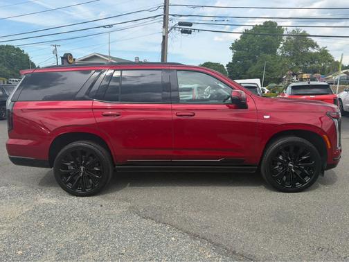 Radiant Red 2026 Cadillac Escalade 4WD Platinum Sport