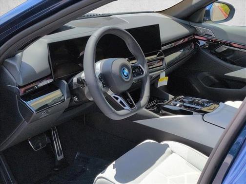 Phytonic Blue Metallic 2026 BMW 550e xDrive