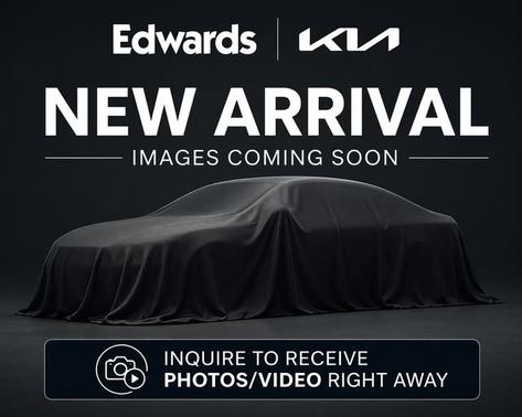 Ivory Silver 2025 Kia Carnival SX