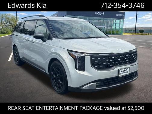 Ivory Silver 2025 Kia Carnival SX