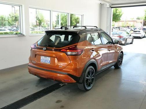 Monarch Orange / Super Black 2023 Nissan Kicks SR