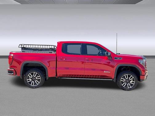 Volcanic Red Tintcoat 2024 GMC Sierra 1500 AT4