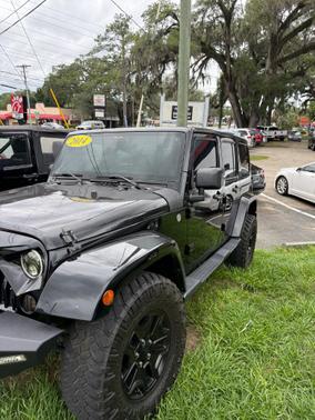 BLACK 2014 Jeep Wrangler Unlimited Sahara