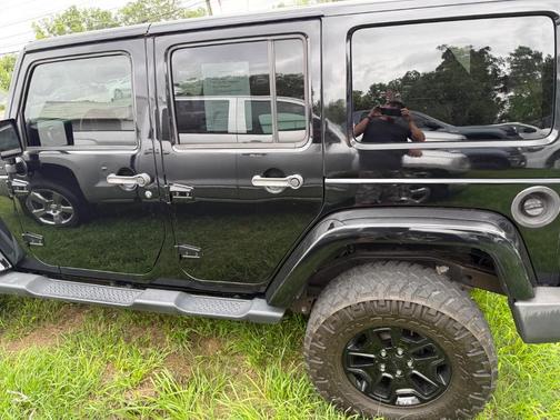 BLACK 2014 Jeep Wrangler Unlimited Sahara