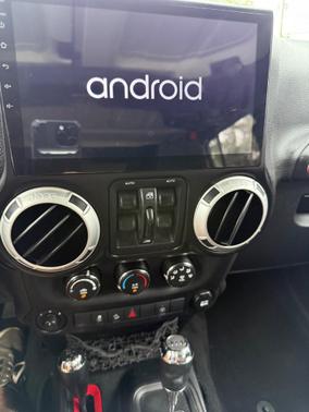BLACK 2014 Jeep Wrangler Unlimited Sahara