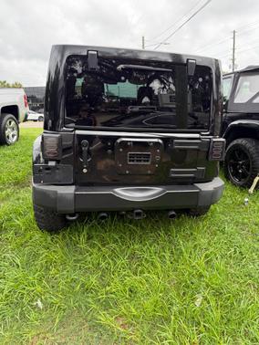 BLACK 2014 Jeep Wrangler Unlimited Sahara