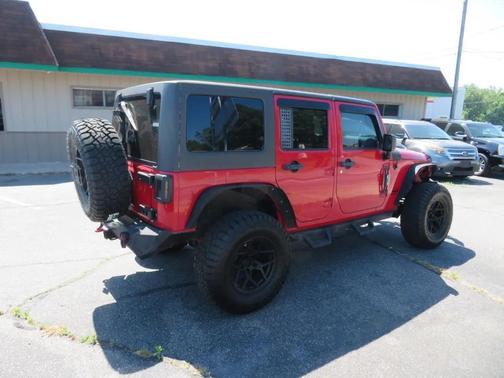 Red 2011 Jeep Wrangler Unlimited Rubicon