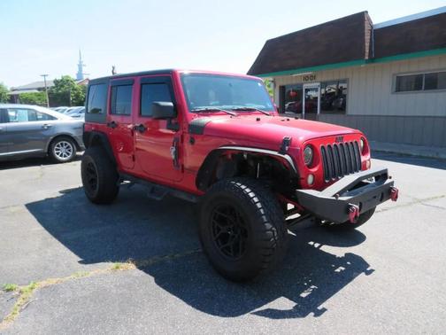 Red 2011 Jeep Wrangler Unlimited Rubicon