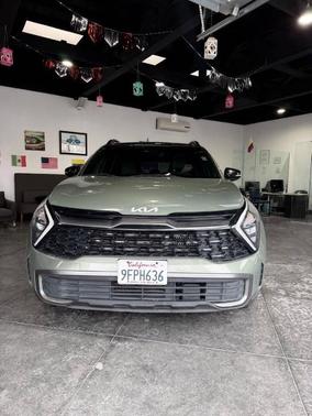 Jungle Green 2023 Kia Sportage Plug-In Hybrid X-Line