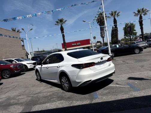 Super White 2021 Toyota Camry Hybrid LE
