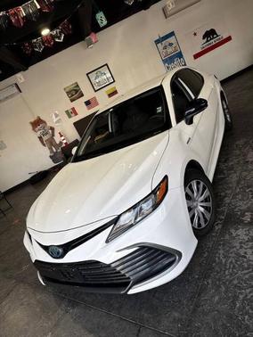 Super White 2021 Toyota Camry Hybrid LE