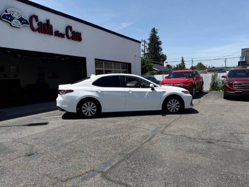 Super White 2021 Toyota Camry Hybrid LE