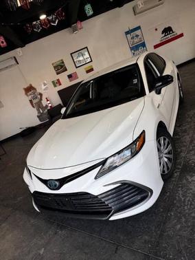 Super White 2021 Toyota Camry Hybrid LE