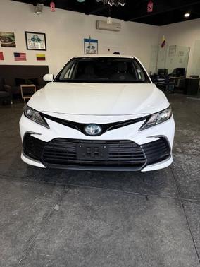 Super White 2021 Toyota Camry Hybrid LE