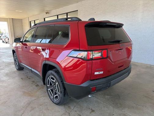 Red 2026 Jeep Cherokee Laredo