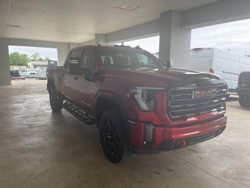 Volcanic Red Tintcoat 2024 GMC Sierra 2500 AT4