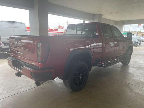 Volcanic Red Tintcoat 2024 GMC Sierra 2500 AT4