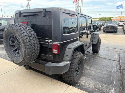 Black Clearcoat 2016 Jeep Wrangler Unlimited Sahara