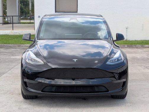 Ultra Red 2025 Tesla Model Y Performance Dual Motor All-Wheel Drive
