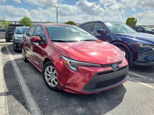 Ruby Flare Pearl 2024 Toyota Corolla Hybrid SE