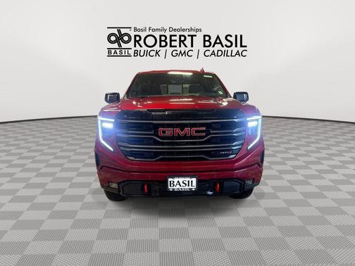 Volcanic Red Tintcoat 2026 GMC Sierra 1500 AT4