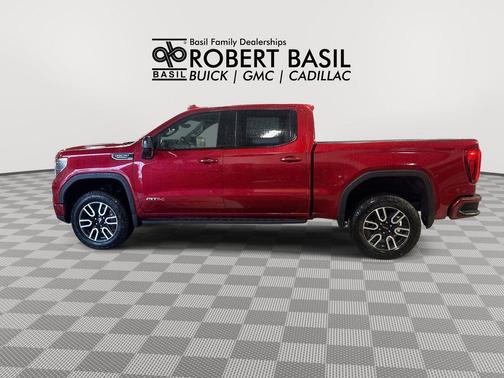 Volcanic Red Tintcoat 2026 GMC Sierra 1500 AT4