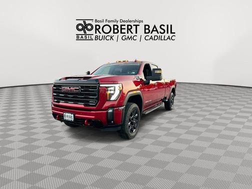 Volcanic Red Tintcoat 2024 GMC Sierra 2500 AT4