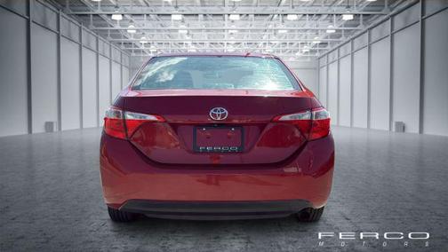 Absolutely Red 2016 Toyota Corolla LE