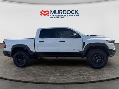 Bright White Clearcoat 2026 RAM 1500 RHO Crew Cab 4x4 5'7' Box