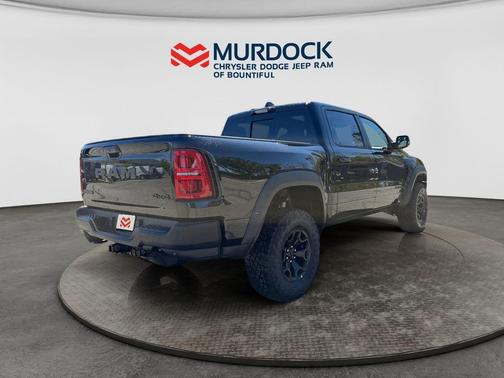 Diamond Black Crystal Pearlcoat 2026 RAM 1500 RHO Crew Cab 4x4 5'7' Box