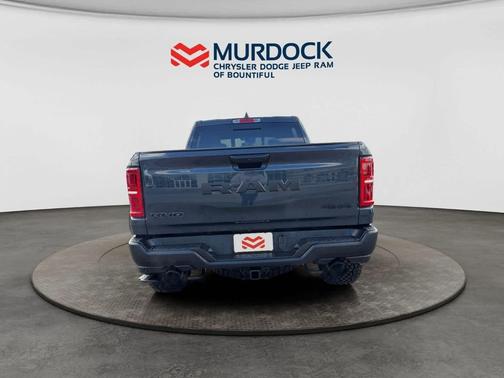 Forged Blue Metallic 2026 RAM 1500 RHO Crew Cab 4x4 5'7' Box