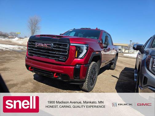 Volcanic Red Tintcoat 2026 GMC Sierra 3500 AT4