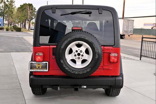 Flame Red 2002 Jeep Wrangler Sport