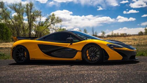 Yellow 2013 McLaren P1 Coupe