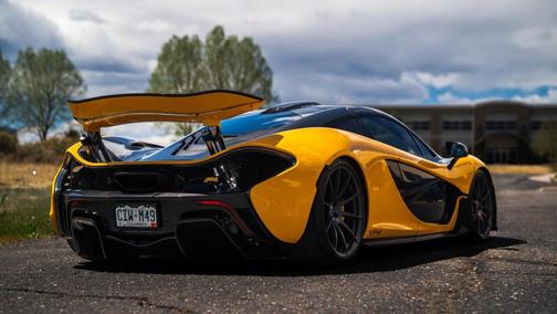 Yellow 2013 McLaren P1 Coupe