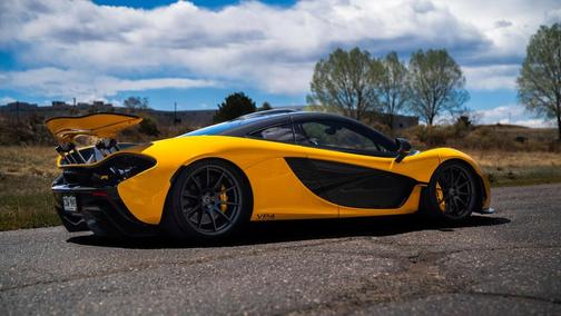 Yellow 2013 McLaren P1 Coupe