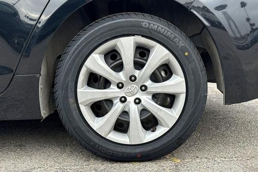 Midnight Black Metallic 2025 Toyota Corolla Hybrid LE