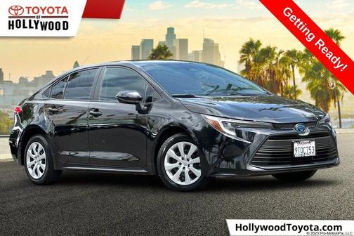 Midnight Black Metallic 2025 Toyota Corolla Hybrid LE