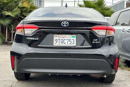 Midnight Black Metallic 2025 Toyota Corolla Hybrid LE