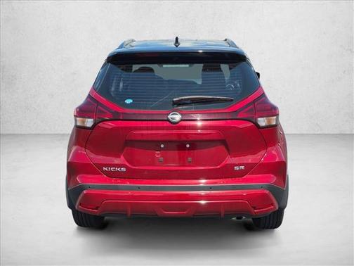 Scarlet Ember Tintcoat/Super Black 2024 Nissan Kicks SR