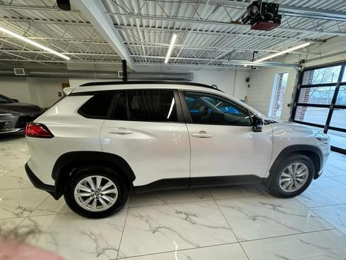 Wind Chill Pearl 2025 Toyota Corolla Cross LE